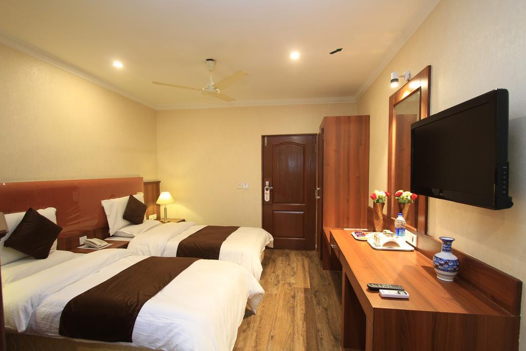 Hotel Noor Empire International Kormangala Bangalore Esterno foto
